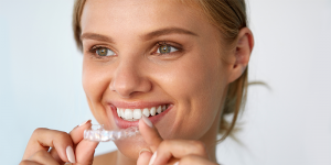 Lady smiling with clear braces 