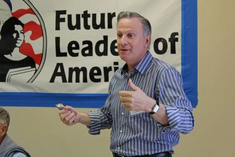 Dr. Fisch speaking to the Ventura community