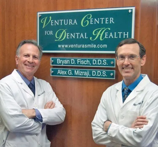 Dr. Fisch and Dr. Maizraji standing by Ventura Center for Dental Health sign